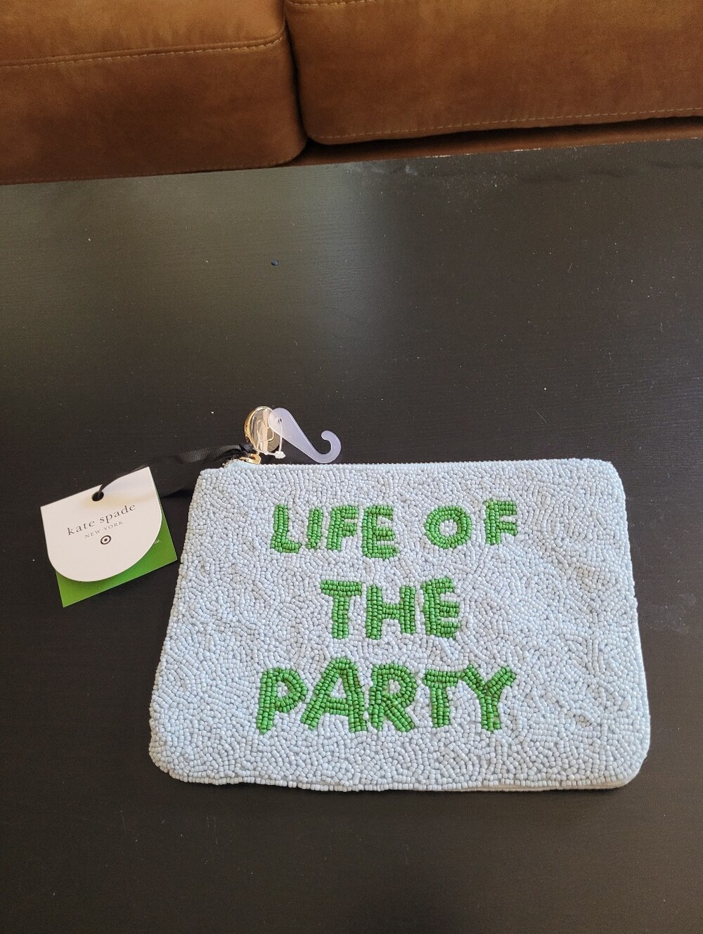 kate spade beaded Life Of The Party pouch in light blue with green lettering